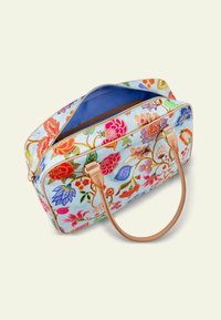 Zachte stoffen tas met een lichtblauwe basis, versierd met kleurrijke bloemmotieven. Rond formaat, dubbele handgrepen en een ritsluiting.