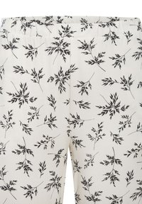 Elastīgas jostas bikses vieglā audumā, kurām ir krēmkrāsas fons ar melniem lapu rakstiem, nodrošinot gludu tekstūru un brīvu piegriezumu.