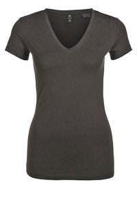 Mörkgrå V-ringad t-shirt i mjuk bomullsblandning. Korta ärmar, figursydd passform och diskret logotypdetalj på bröstet.