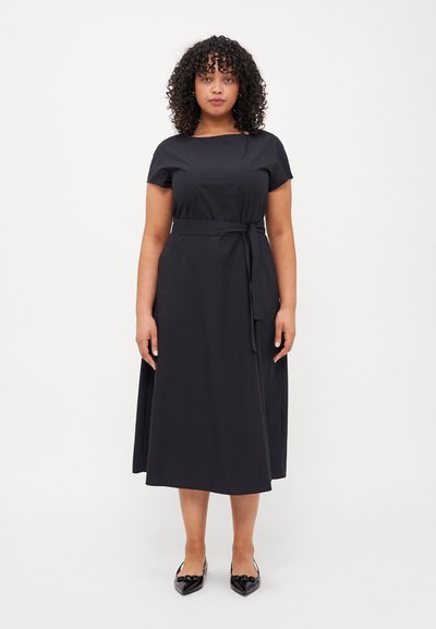 Black midi dress with short sleeves, a fitted bodice, and a tied waist belt. Smooth texture, with a straight skirt falling to mid-calf length.
