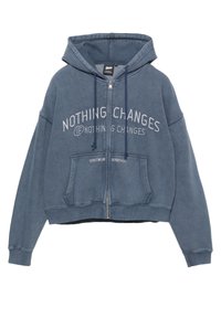 Blaues, kurzes Zip-Hoodie aus Baumwollmischung. Verfügt über eine Kängurutasche, Kordeln und ein Vorderdesign in kontrastierendem Weiß.