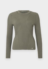 Ελιάς πράσινη ριμπ πλεκτή μπλούζα με μακριά μανίκια, με υφασμάτινες πάνελ και μια μικρή λογότυπη λεπτομέρεια στο στρίφωμα. Στρογγυλή λαιμόκοψη.