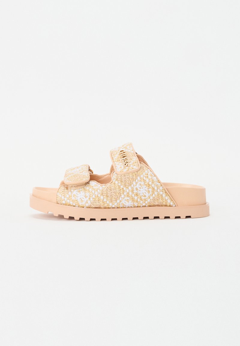 Slide sandal with a tan base and textured gold fabric upper, featuring two adjustable Velcro straps and a patterned design.