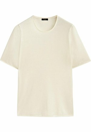 T-shirt en coton crème à manches courtes, col rond avec petite étiquette noire de la marque à l’intérieur du col.