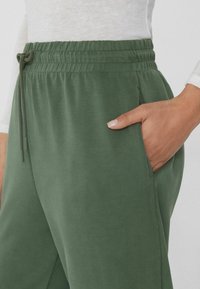 Tezenis Jogginghose - grün w military green