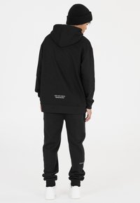 Les'Arcs Kapuzenpullover - zwart