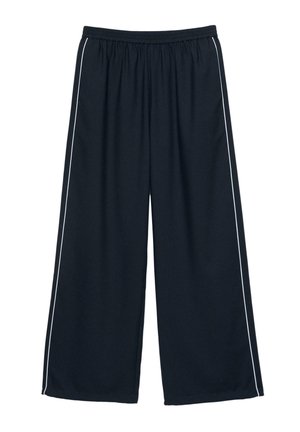 Sortte bukser med brede ben og elastisk taljebånd samt hvide piping detaljer, der løber vertikalt langs de ydre sømme.