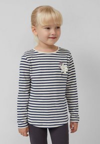 Gestreept langarm shirt in navy en witte katoen, met een decoratieve stoffen bloem aan de linkerzijde, een ronde halslijn en een gebogen onderkant.
