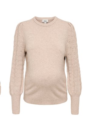 Beige strikket graviditetsgenser med puffede, hullmønstrede ermer i full lengde og ribbestrikkede mansjetter og nederkant.