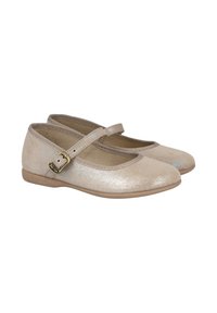 Zapatos Mary Jane brillantes en color beige para niña, con punteras redondas, correas con hebilla y suelas planas, mostrados uno al lado del otro sobre un fondo blanco.