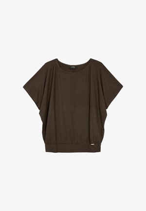Brązowa krótka bluzka z luźnym krojem i marszczonym dołem. Miękki materiał o gładkiej fakturze z subtelnym akcentem logo przy dolnej krawędzi.
