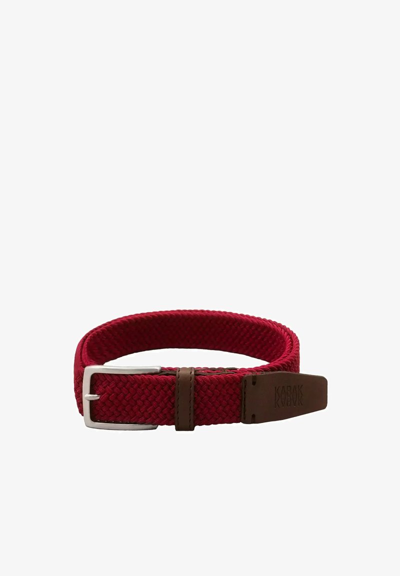 Woven red belt with a silver metal buckle, brown leather accents, flat texture, an adjustable length, and a casual design.