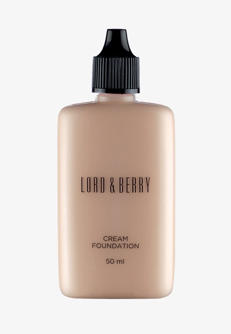 Fondotinta cremoso in una bottiglia beige con tappo contagocce nero, con testo nero per il nome del marchio e del prodotto, dimensione 50 ml.