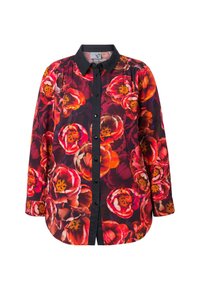 Blomster skjorte med knapfront, der har livlige orange og røde tulipanmønstre på en sort baggrund; lange ærmer og klassisk krave.