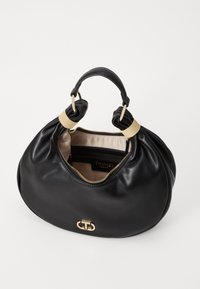 Black leather handbag with a rounded shape, gold hardware accents, and a fabric-lined interior. Features a zip closure and logo detail.