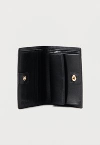 Black leather wallet featuring a textured surface, multiple card slots, a central compartment, and a gold snap closure.