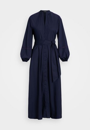 Marineblaues Baumwollkleid mit knöpfbarem Vorderteil, hohem Ausschnitt und langen Ballonärmeln. Verfügt über einen Bindegürtel und Spitzenakzente an den Ärmeln.