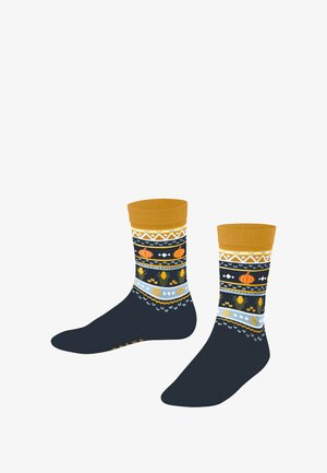 Marineblauwe enkelsokken met een mosterdgekleurde geribbelde manchette, versierd met feestelijke patronen in oranje, geel en blauw, waaronder pompoenen en bloemmotieven.