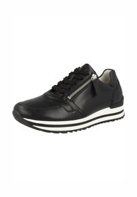 Baskets en cuir noir avec fermeture à lacets et détail de zip sur le côté. Présentent une semelle rayée blanche et noire pour le contraste et l'adhérence.
