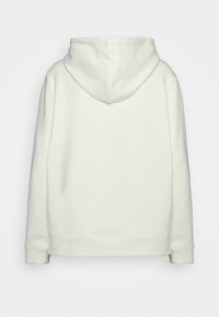 Bluza z kapturem w kremowym kolorze, wykonana z miękkiego materiału. Posiada luźny krój oraz ściągacze przy mankietach i u dołu, charakteryzując się prostym, gładkim wzorem.