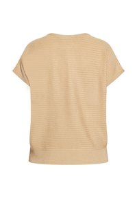 Top bej cu mânecă scurtă, cu o textură ribbed, având o croială relaxată și un decolteu rotund. Materialul pare moale și ușor.
