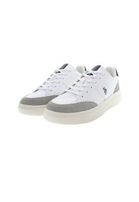 Vita sneakers med grå mockadetaljer, rund tå, platt vit gummisula och logotypdetaljer på sidan och tungan. Snörningsdesign.