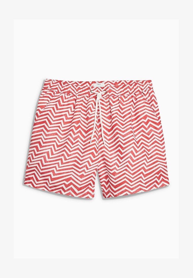 Short de bain rouge et blanc à motif zigzag, avec cordon blanc, ceinture élastique, poches avant et coupe décontractée.