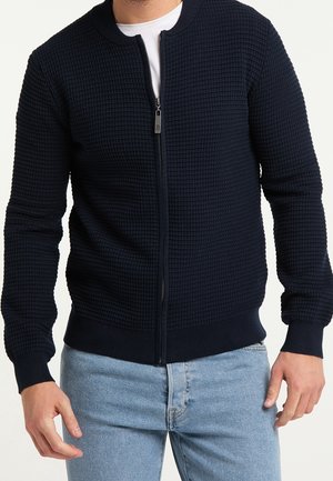 Neuletakki - mottled dark blue