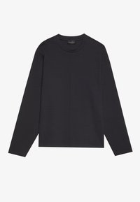 T-shirt noir à manches longues en tissu doux avec un col rond, présentant un design simple et une coupe droite. Aucun motif ni accent visible.