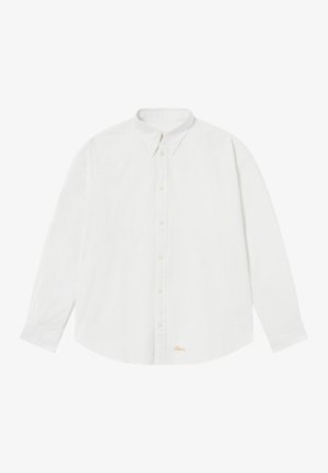 Balta krekla ar garām piedurknēm, vertikālām svītrām, pogu apkakli un noapaļotu apakšu. Satur mazu izšūtu logotipu oranžā krāsā.