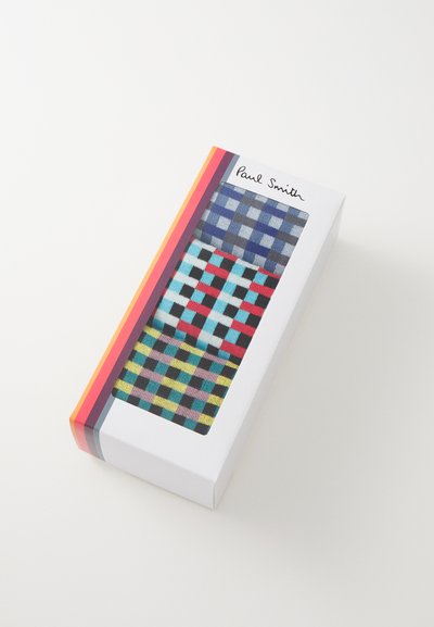 Coffret de chaussettes à motifs avec un mélange de couleurs : carreaux bleus, rouges et jaunes, avec une finition texturée, marqué Paul Smith.