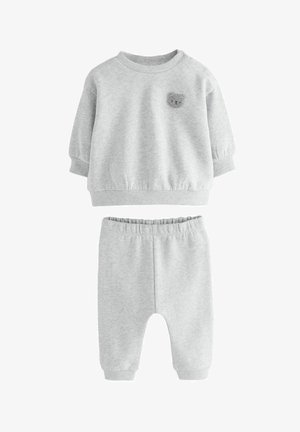 Set di felpa e pantaloni per toddler grigio chiaro con polsini e vita a coste, caratterizzato da un piccolo volto di orsetto di peluche sul petto.