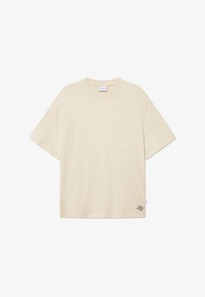 Cream-colored t-shirt made of cotton, featuring a round neckline, short sleeves, and a subtle logo detail embroidered on the bottom right.