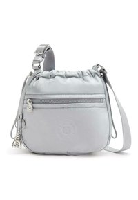 Light gray nylon shoulder bag with a drawstring top, front zipper pocket, embossed logo, and silver hardware accents. Includes a keychain charm.