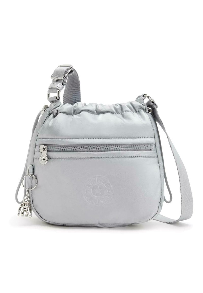 Light gray nylon shoulder bag with a drawstring top, front zipper pocket, embossed logo, and silver hardware accents. Includes a keychain charm.