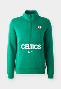 Sweat-shirt vert en polaire avec fermeture éclair au quart et grand texte blanc "CELTICS", logo Nike, et logo des Celtics brodé sur la poitrine.
