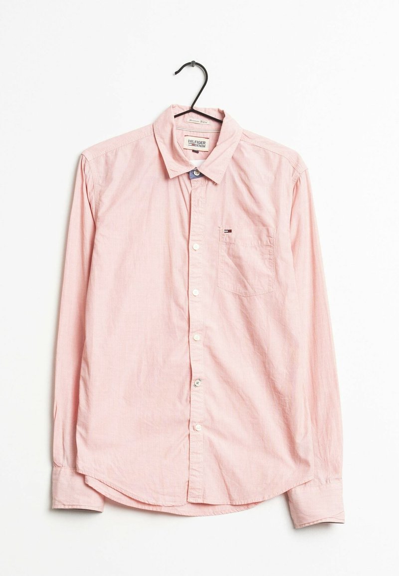 Light pink long-sleeve button-up shirt made of textured cotton, featuring a chest pocket with a small logo, and a button-down collar.
