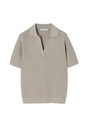 Beige short-sleeved polo top, made of textured knit fabric, featuring a V-neck and a contrasting collar, with a relaxed fit.