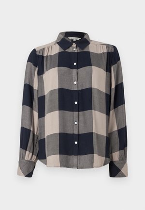 Chemise à boutons, présentant un grand motif à carreaux gris et marine, avec un col, des manches longues et des accents froncés aux épaules.