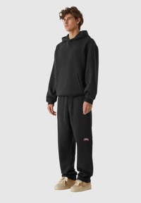 Lost Youth CORE COMFORT - Spodnji deli trenirk - black
