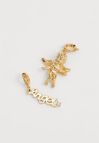 Gold charm set featuring a cherubic figure and the word "angel" in cursive, with a small diamond accent on the letter "g."