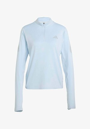 Hellblauer langärmliger Sportpullover mit Viertelreißverschluss und dezentem Logo auf der linken Brust und den Ärmeln.