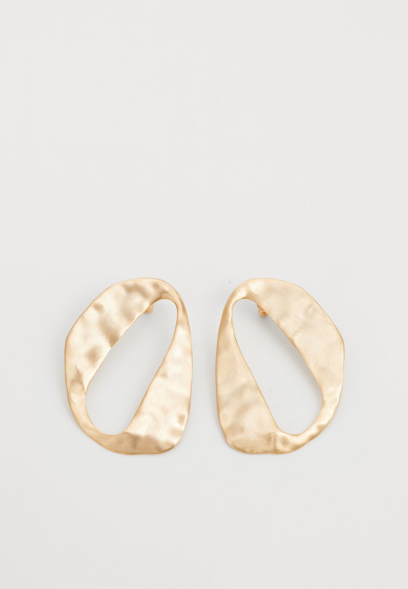 Pair of irregular oval-shaped gold-toned metal earrings with a textured, slightly hammered surface on a white background.