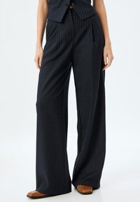 Koton PALAZZO - Tygbyxor - dark blue