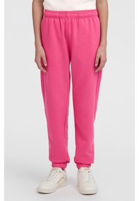 Roza trenirka z elastičnim pasom in manšetami. Narejena iz mehkega materiala, z sproščenim krojem in minimalnim okrasjem.