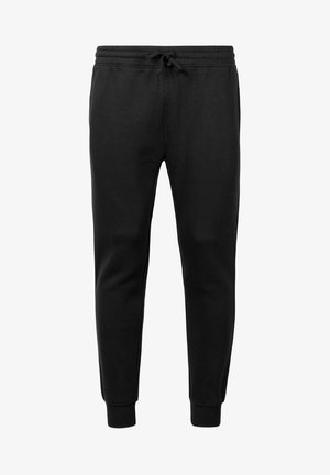 Zwarte joggers van een mengsel van katoen, met een elastische tailleband met trekkoord, geribbelde boorden en een gladde textuur.