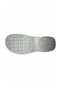 Suela de zapato de goma blanca con un patrón de relieve en zigzag. Las marcas incluyen tamaños y detalles de la marca grabados en la superficie. Textura general suave.