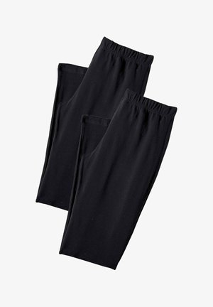 Leggings negros hechos de una tela elástica y suave con una cinturilla elástica. Sin bolsillos ni adornos, diseño limpio y sencillo.