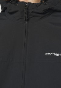Carhartt WIP Mezisezónní bunda  - black