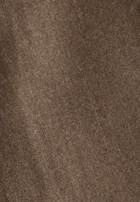 Brown fabric with a soft, textured surface, featuring a subtle sheen and a fine, woven pattern. Suitable for various textile applications.